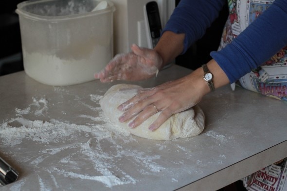 kneading bread dough